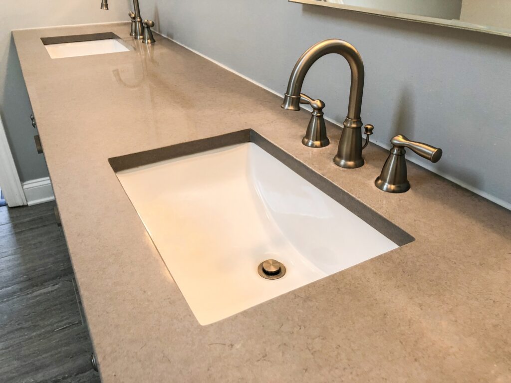 Double sink quartz countertop in big bathroom